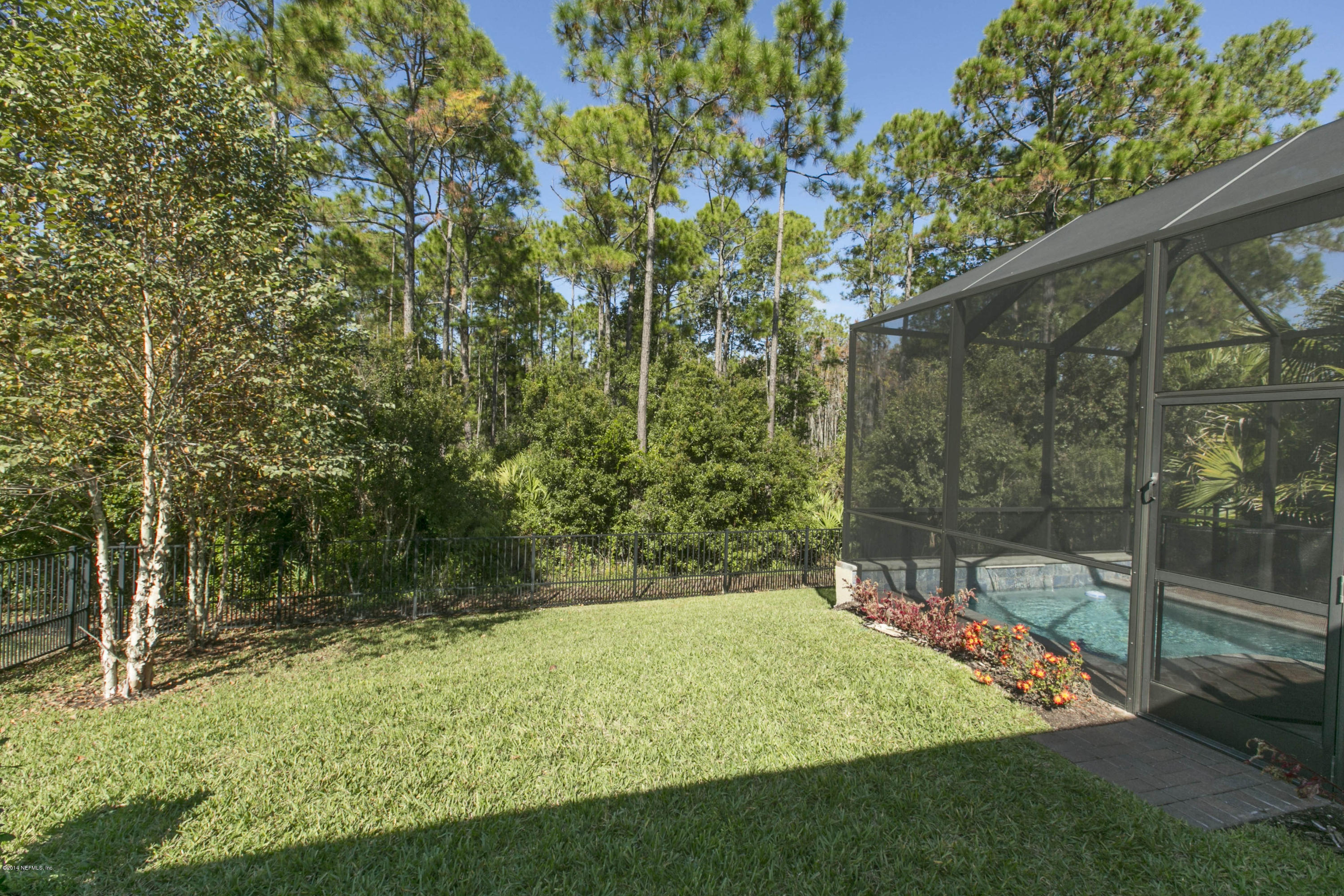 58 Pelican Pointe Road Ponte Vedra, FL 32081 - Photo 22 of 28 a view of a backyard with a small cabin