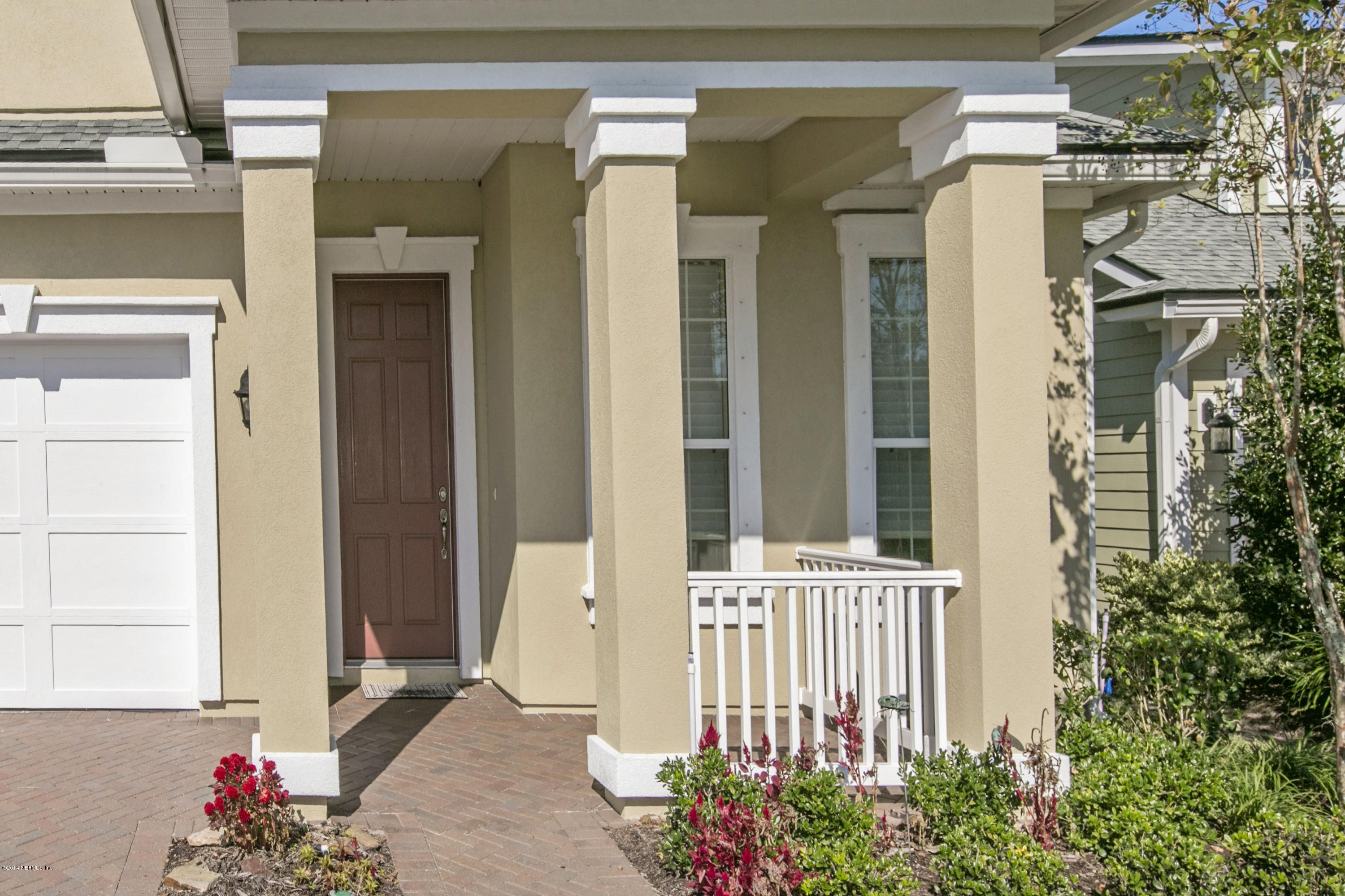 58 Pelican Pointe Road Ponte Vedra, FL 32081 - Photo 3 of 28 a front view of a house with a porch