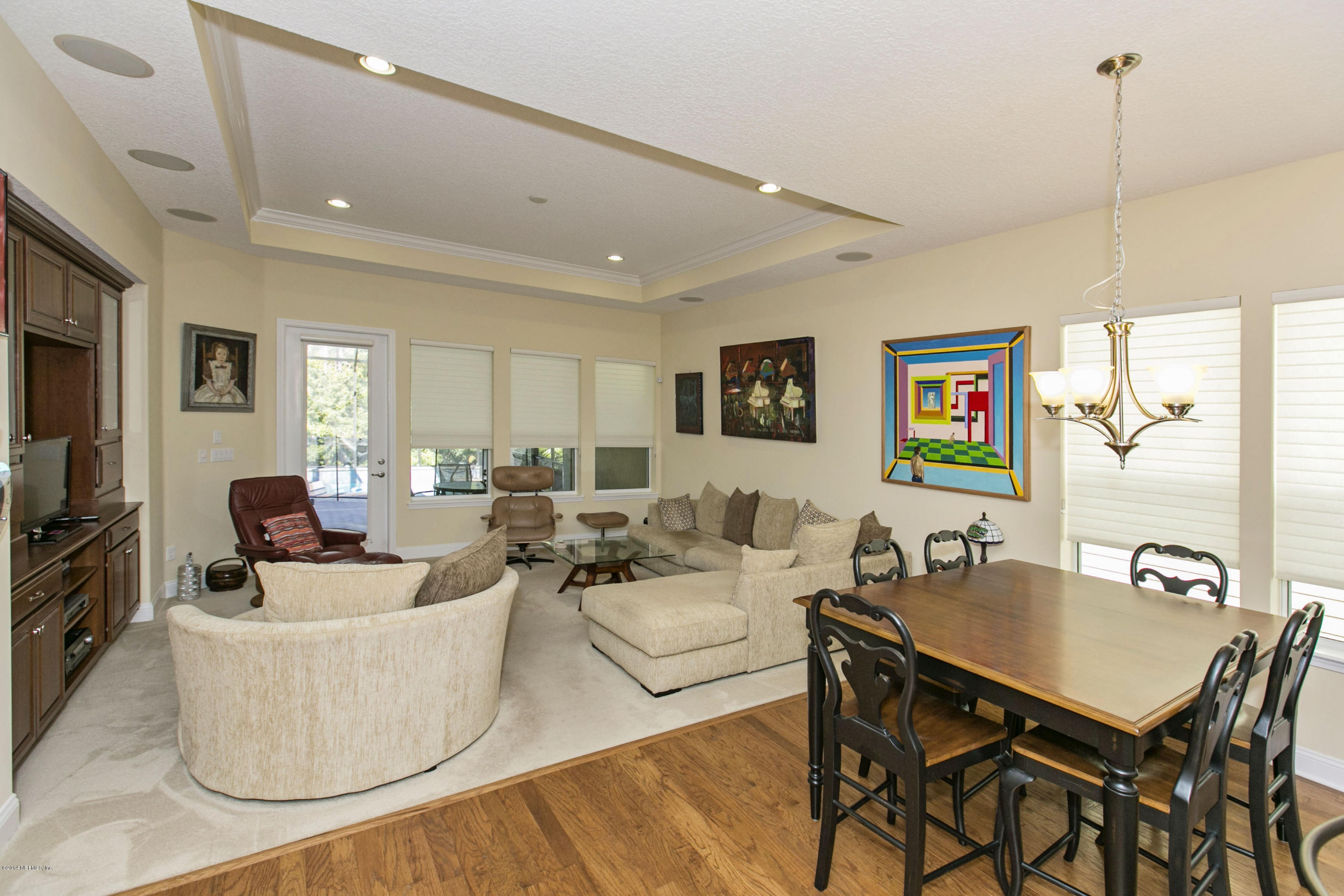 58 Pelican Pointe Road Ponte Vedra, FL 32081 - Photo 8 of 28 a living room with couches and a flat screen tv