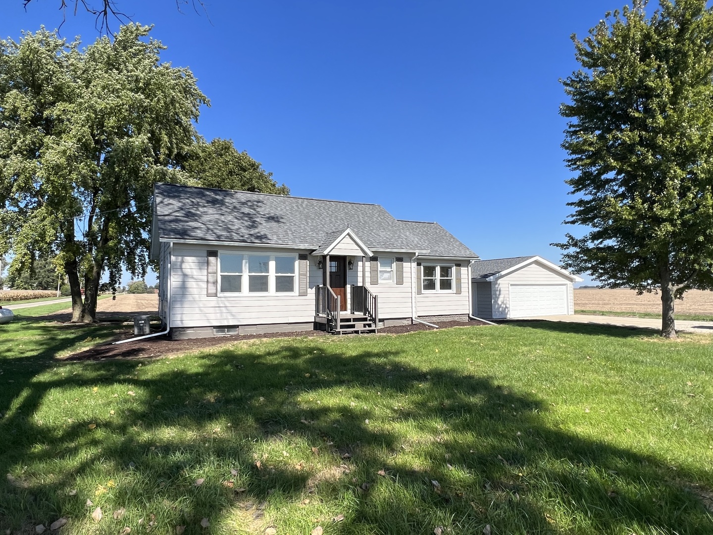 1980 West Grand Ridge Road Mazon, IL 60444 - Photo 1 of 21 a front view of a house with yard and tree
