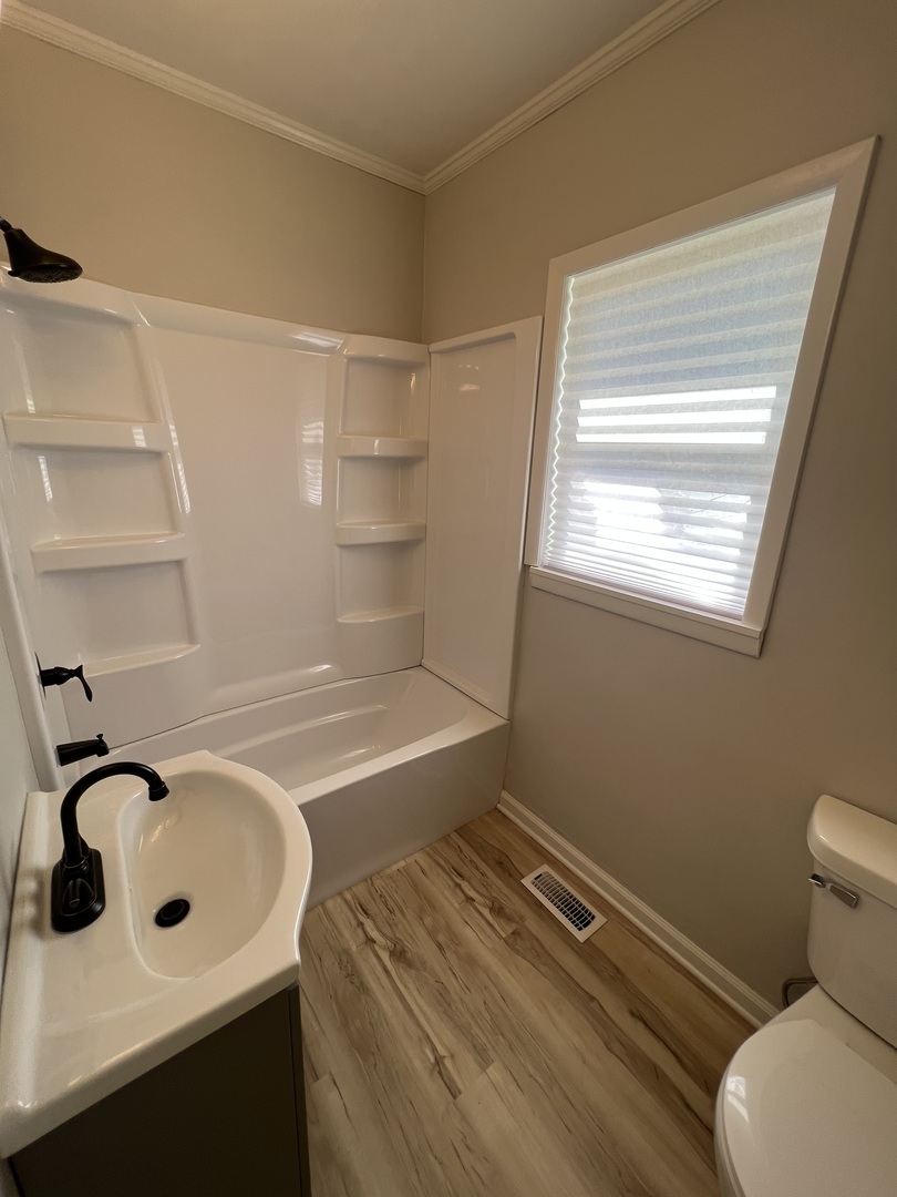 1980 West Grand Ridge Road Mazon, IL 60444 - Photo 12 of 21 a bathroom with a sink a toilet and shower