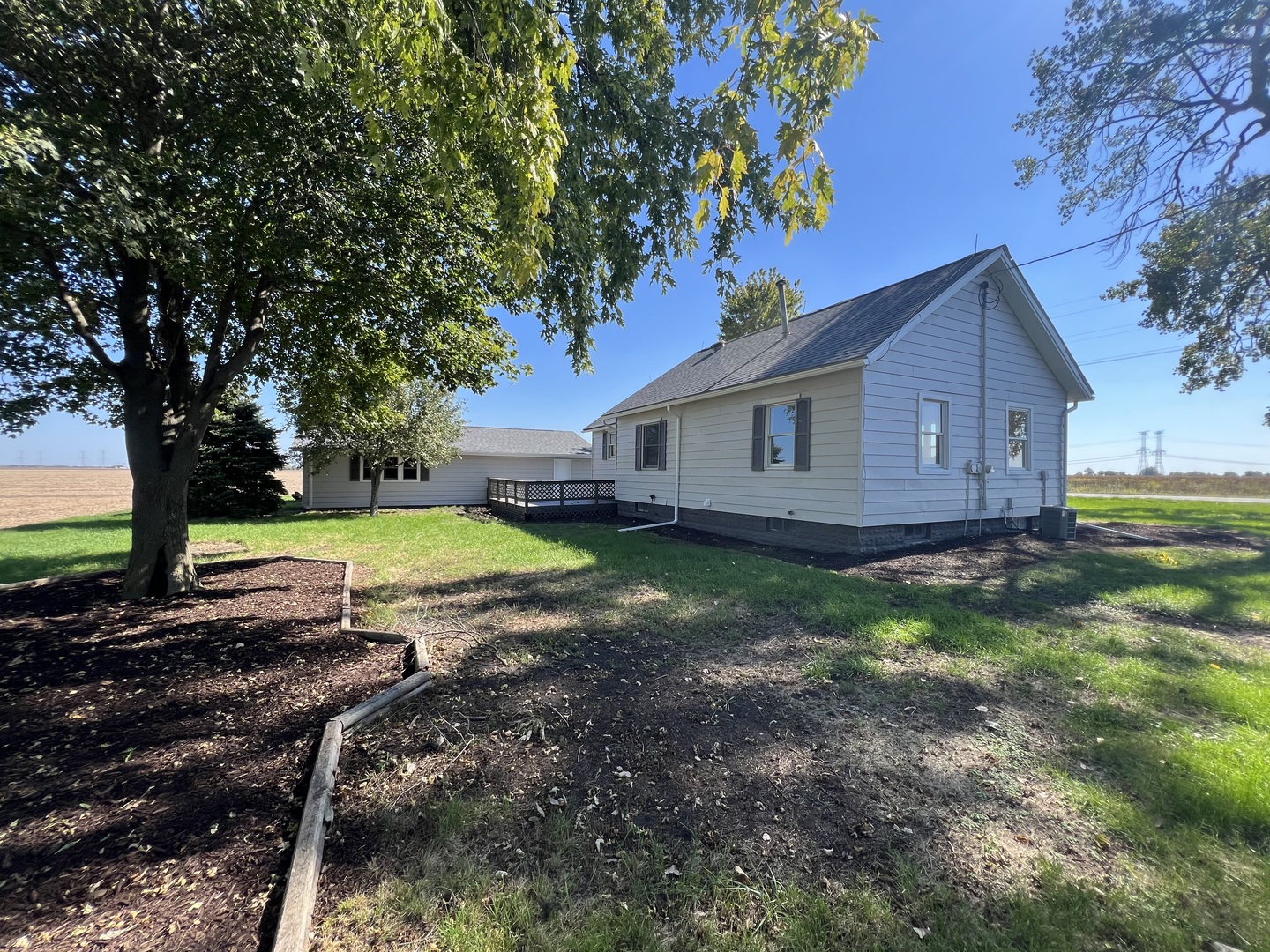 1980 West Grand Ridge Road Mazon, IL 60444 - Photo 15 of 21 a view of a house with backyard and sitting area