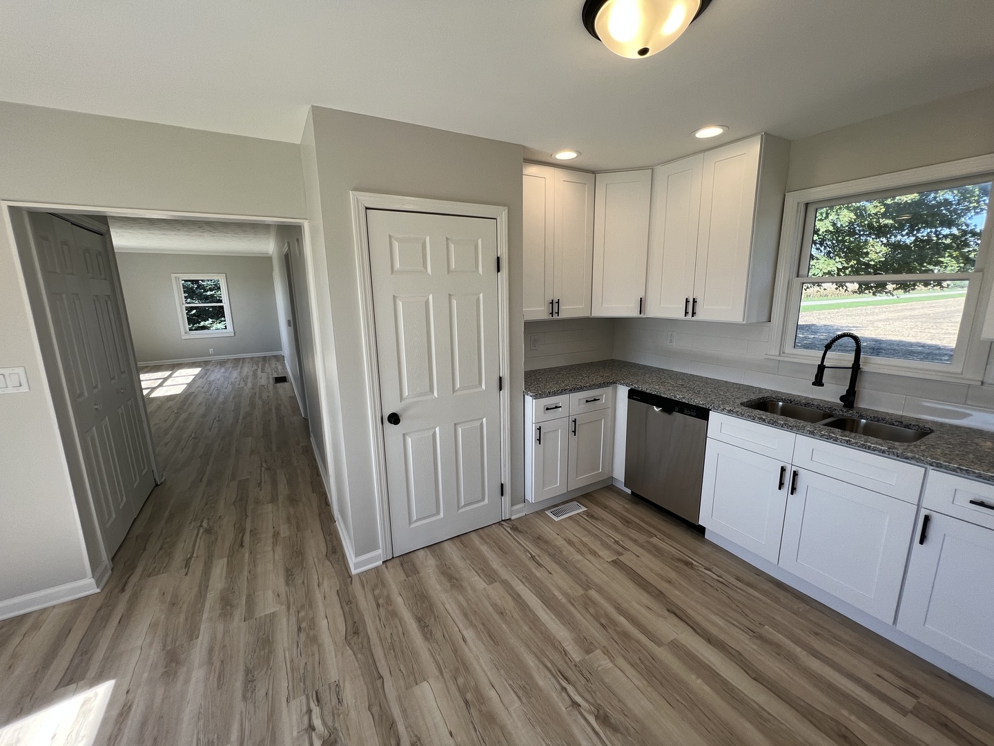1980 West Grand Ridge Road Mazon, IL 60444 - Photo 3 of 21 a kitchen with a sink and wooden floor