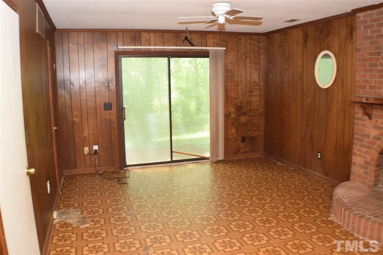 7613 Mine Valley Road Raleigh, NC 27615 - Photo 16 of 24 a view of an empty room with window and bathroom