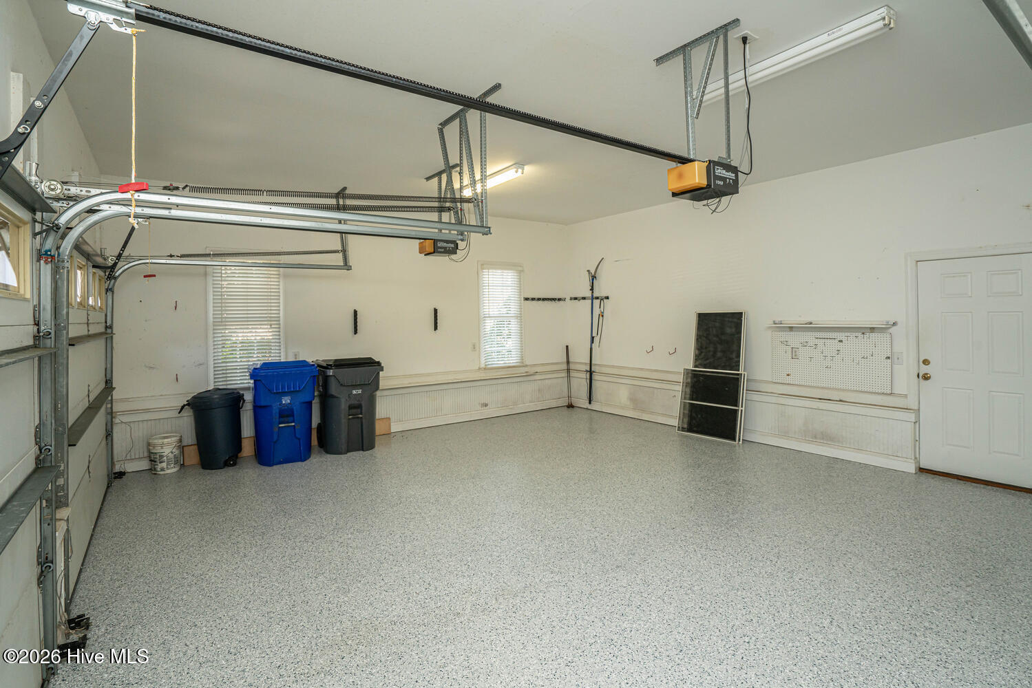 523 Candlewick Lane Southwest Ocean Isle Beach, NC 28469 - Photo 44 of 85 Garage with Epoxy Coating on the Floor