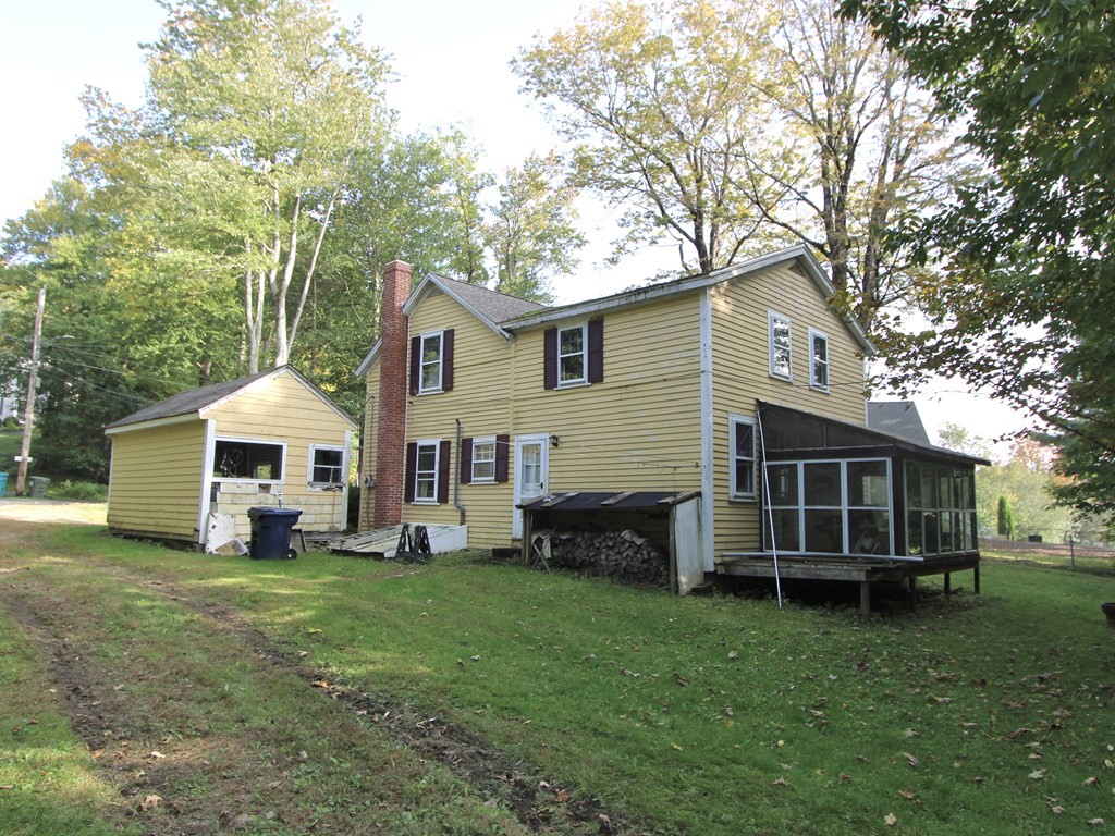 171 Chapel Street Leicester, MA 01524 - Photo 5 of 10 a front view of a house with a yard