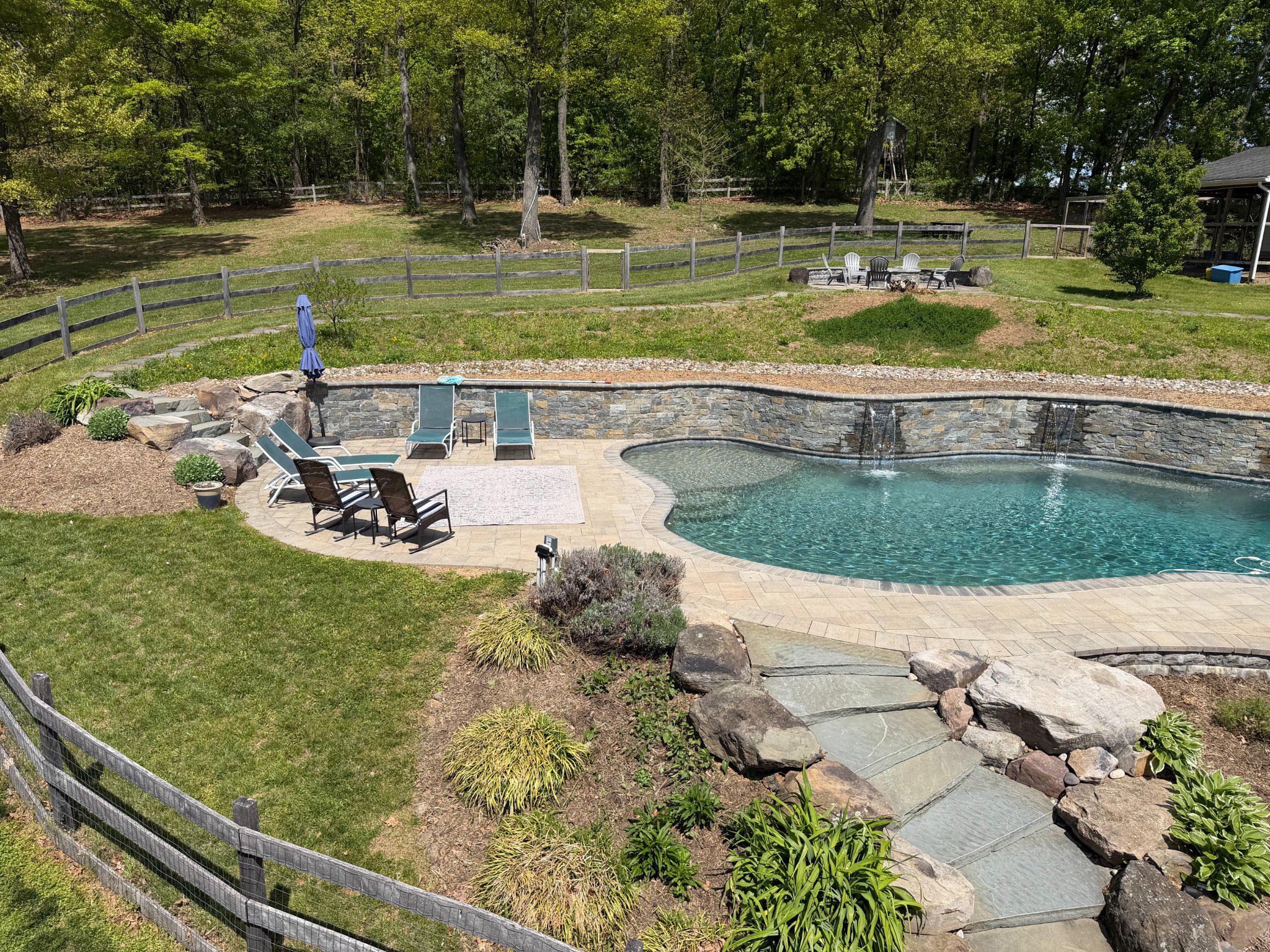 4001 Young Road Manchester, MD 21102 - Photo 51 of 65 a view of a swimming pool with a yard and sitting area