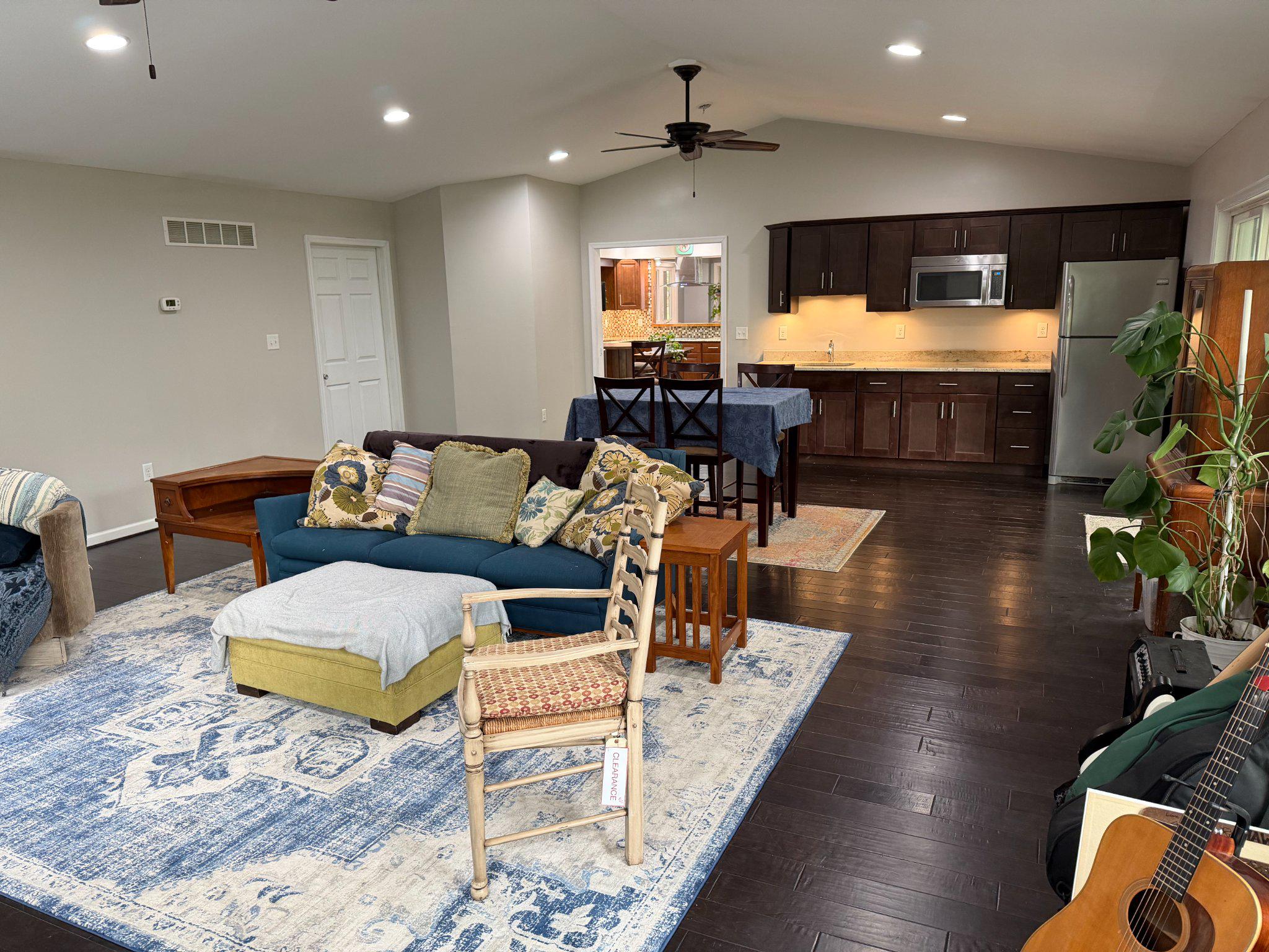 4001 Young Road Manchester, MD 21102 - Photo 8 of 65 a living room with furniture kitchen view and a wooden floor