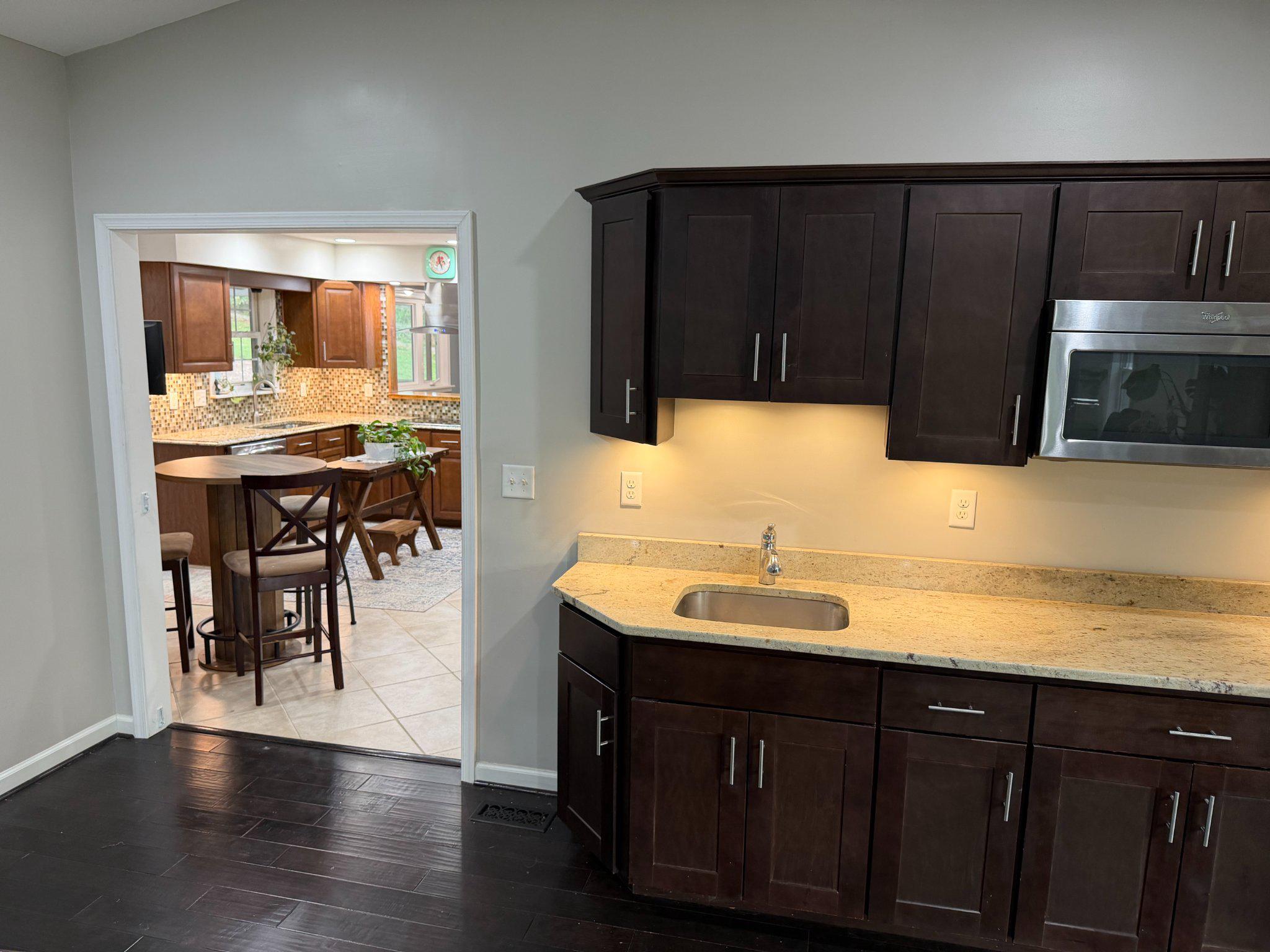 4001 Young Road Manchester, MD 21102 - Photo 10 of 65 a kitchen with a sink and cabinets
