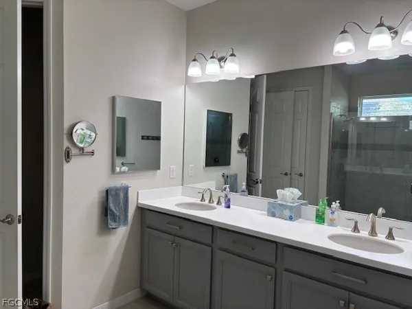 a living room with closet and furniture