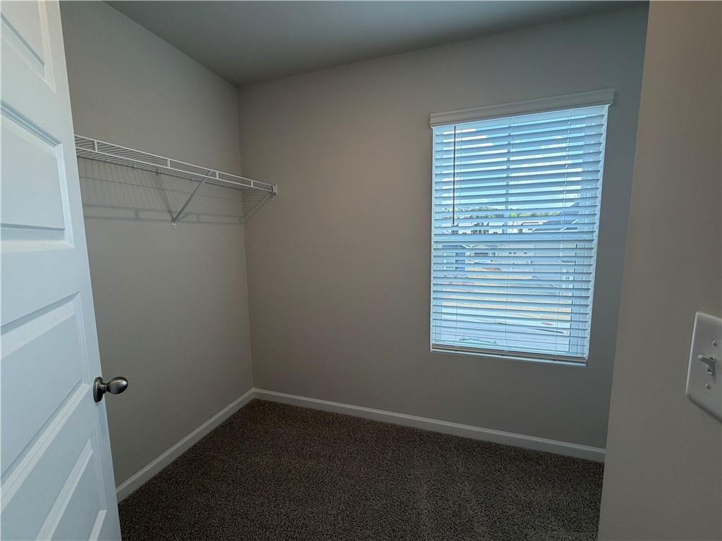 79 Holland Cove Winder, GA 30680 - Photo 14 of 25 a view of an empty room with a window