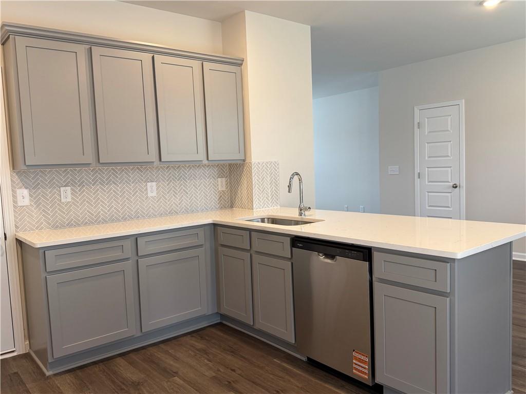 79 Holland Cove Winder, GA 30680 - Photo 8 of 25 a kitchen with a sink cabinets and wooden floor