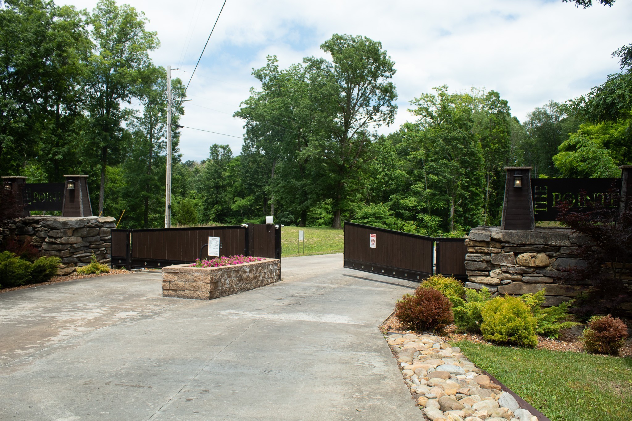 80 B Swan Ridge Celina, TN 38551 - Photo 11 of 23 a view of a chairs setting in the backyard