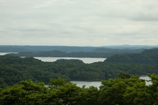 a view of mountain with lake view