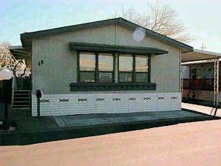 48 Leisure Santa Rosa, CA 95401 - Photo 1 of 1 a front view of a house with a yard