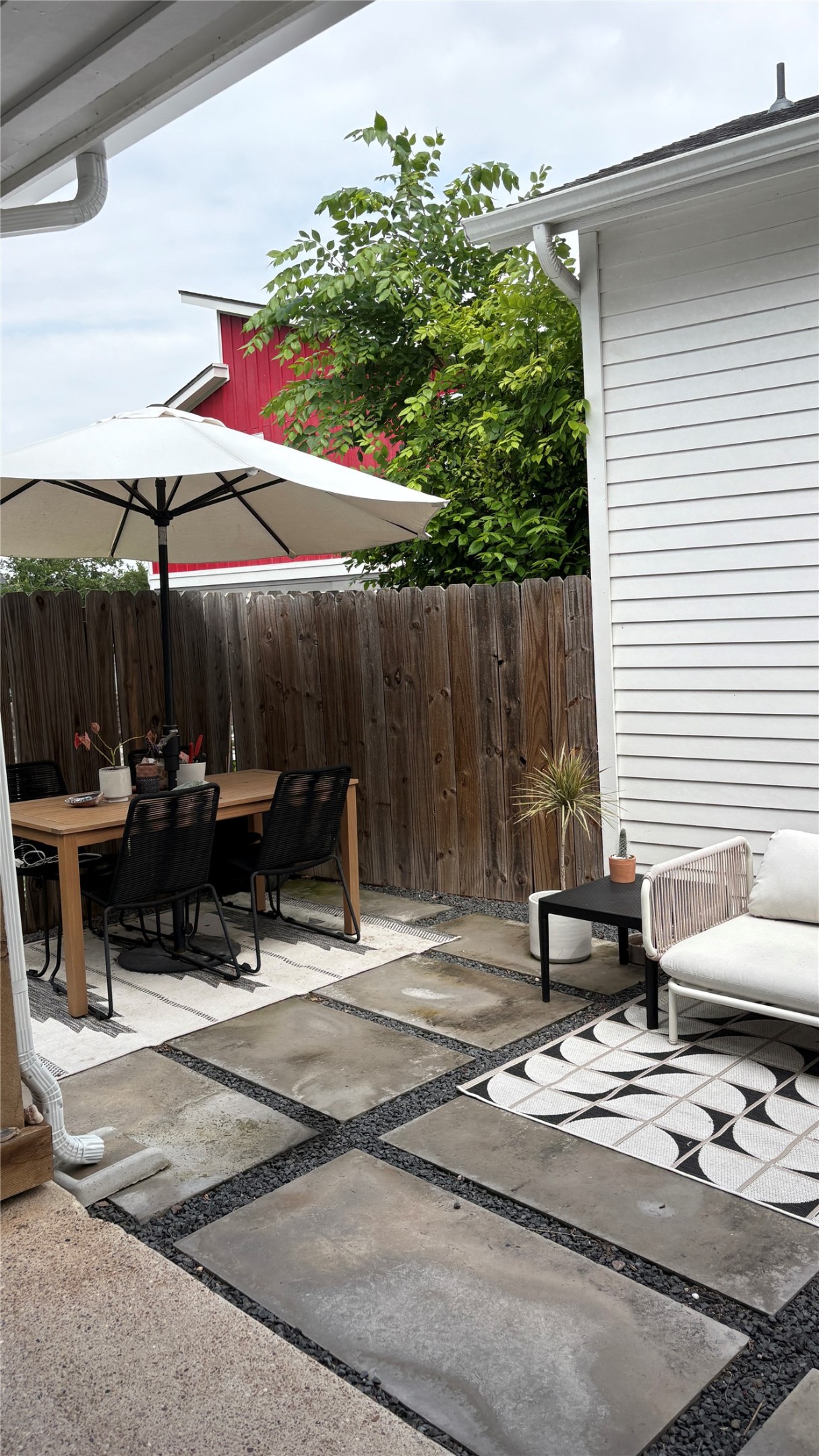 1816 Adina Street, Unit 2 Austin, TX 78721 - Photo 22 of 25 Private patio area featuring large format concrete pavers set in dark gravel