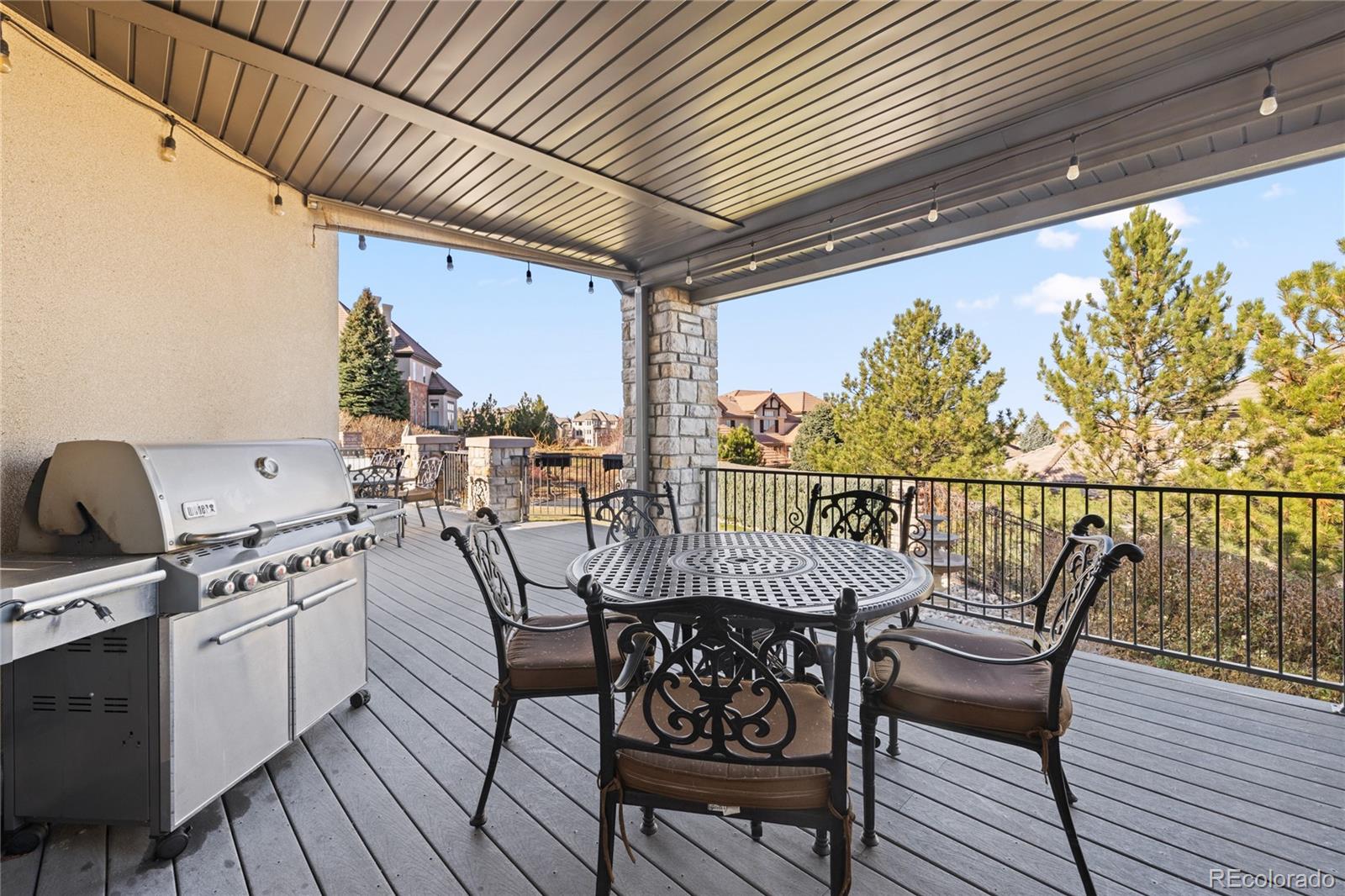 8751 Crooked Stick Place Lone Tree, CO 80124 - Photo 20 of 50 a view of a chairs on the roof deck