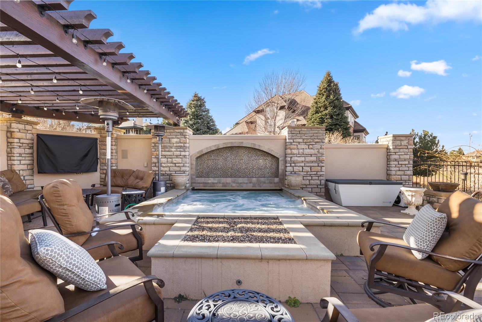 8751 Crooked Stick Place Lone Tree, CO 80124 - Photo 25 of 50 a building outdoor space with patio furniture