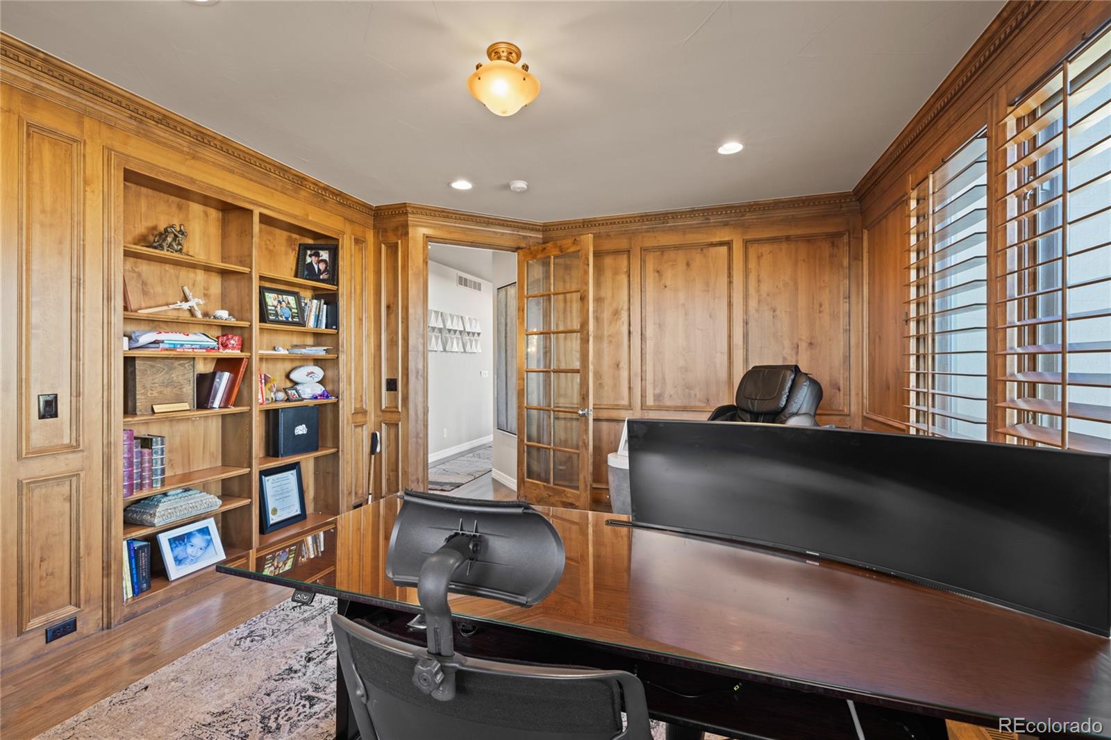 8751 Crooked Stick Place Lone Tree, CO 80124 - Photo 29 of 50 a view of a workspace with furniture and a window