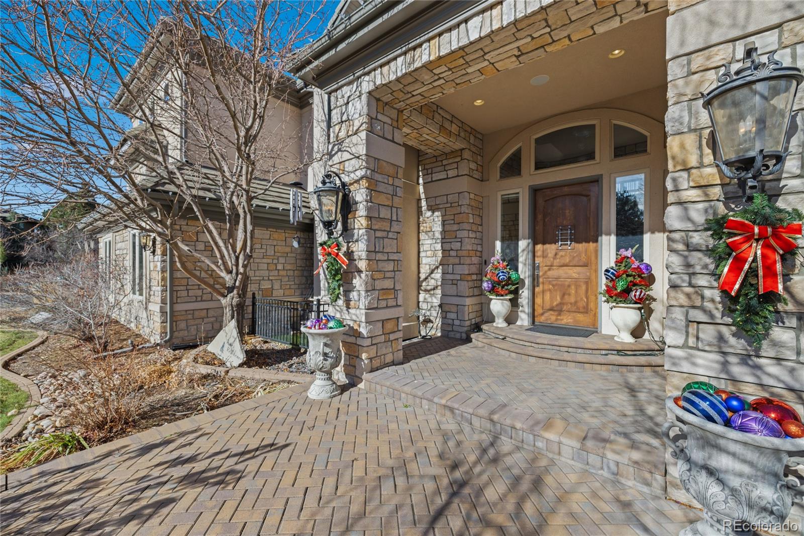 8751 Crooked Stick Place Lone Tree, CO 80124 - Photo 4 of 50 a view of parking area of a house