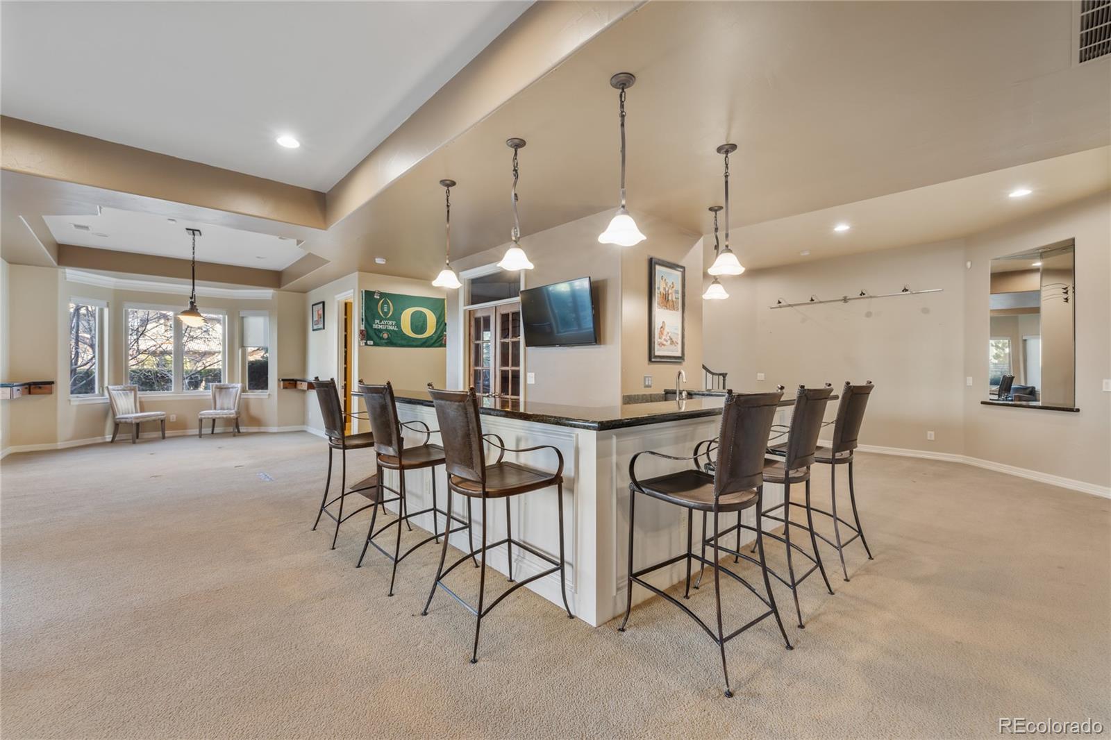 8751 Crooked Stick Place Lone Tree, CO 80124 - Photo 48 of 50 a view of a dining room and livingroom view