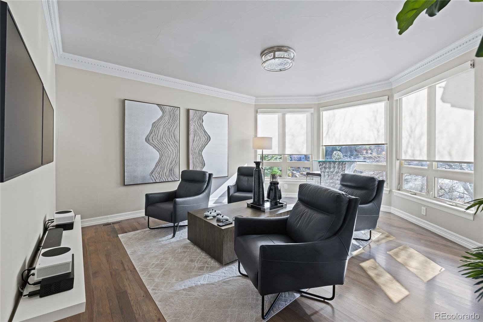 8751 Crooked Stick Place Lone Tree, CO 80124 - Photo 7 of 50 a living room with fireplace furniture and a large window