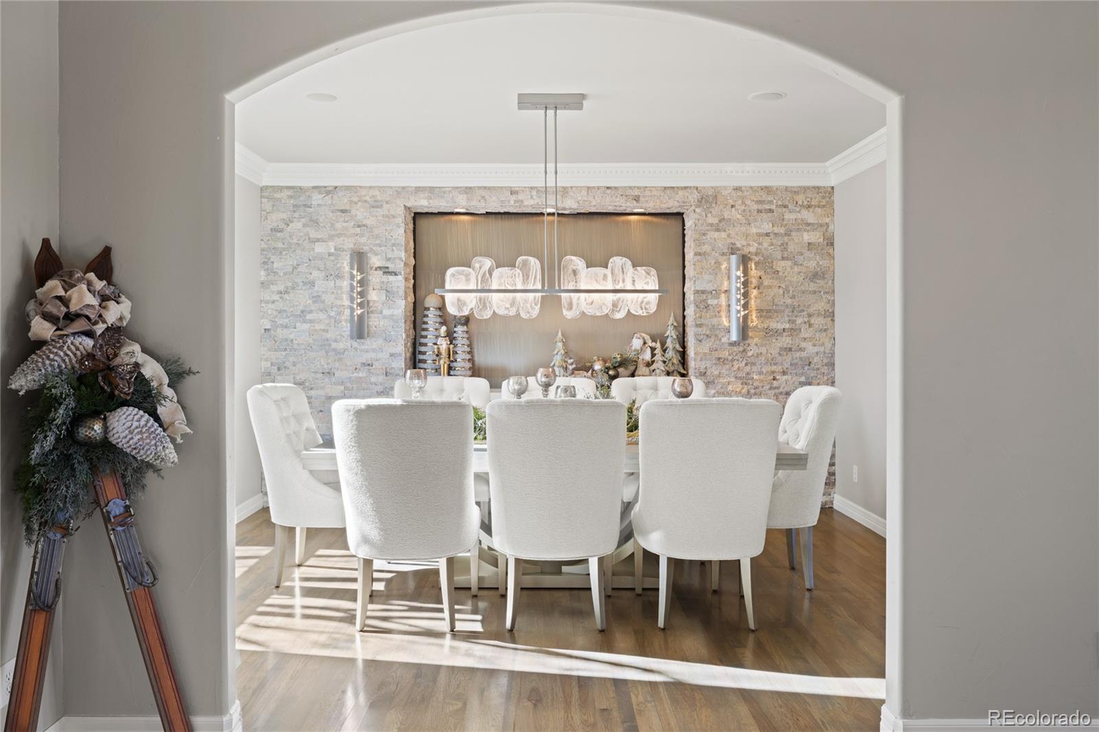 8751 Crooked Stick Place Lone Tree, CO 80124 - Photo 8 of 50 a dining room with furniture window and outside view