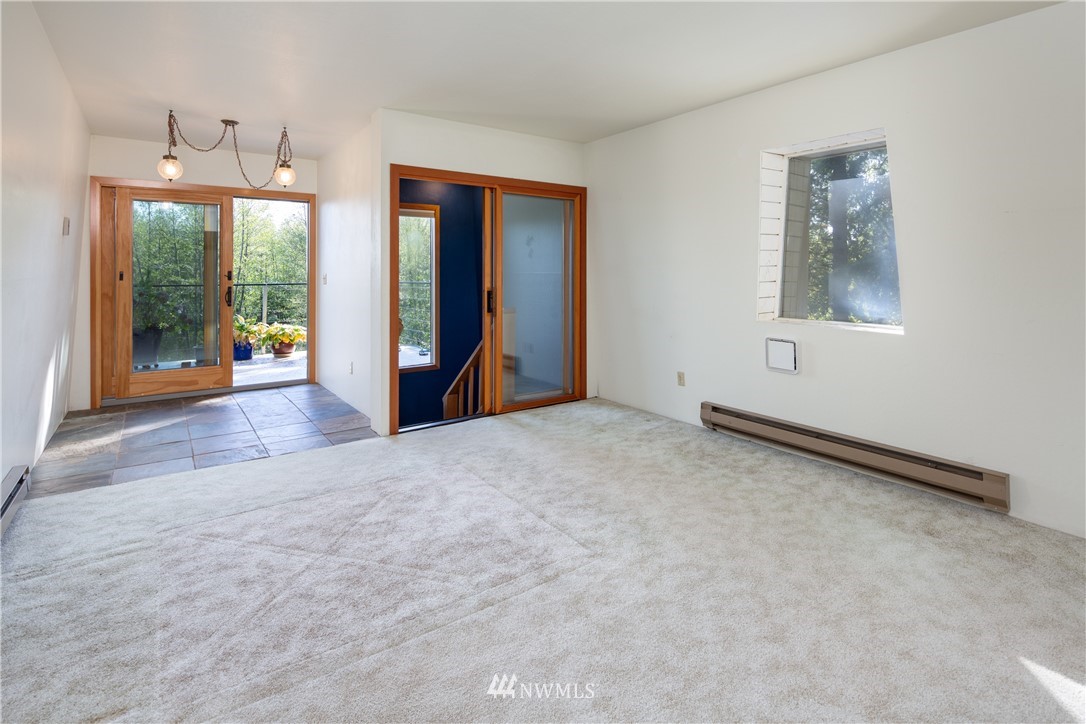5852 Storr Road Ferndale, WA 98248 - Photo 12 of 25 an empty room with window and outdoor view