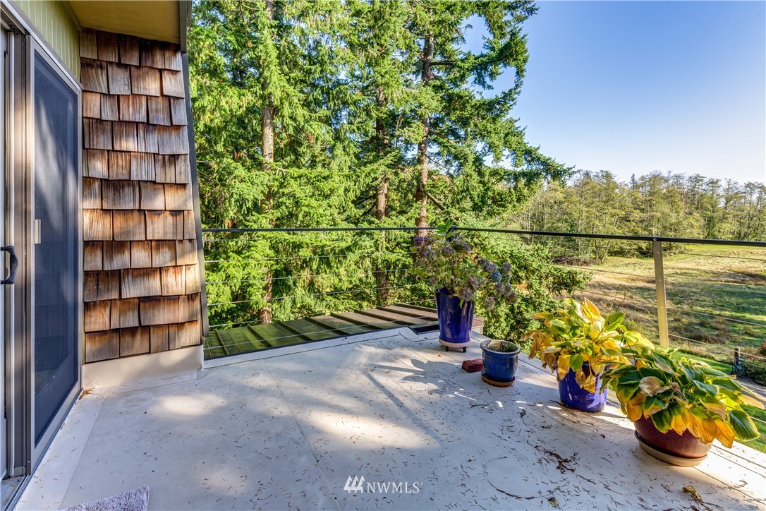 5852 Storr Road Ferndale, WA 98248 - Photo 14 of 25 a view of a street with potted plants