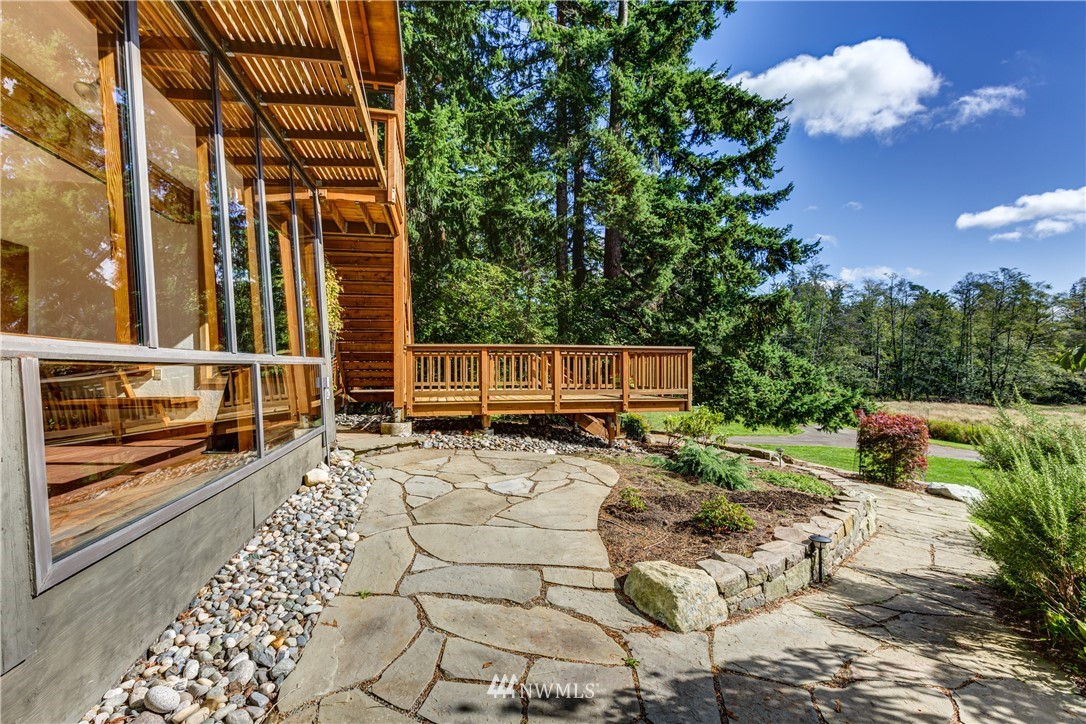 5852 Storr Road Ferndale, WA 98248 - Photo 19 of 25 a view of a backyard with sitting area