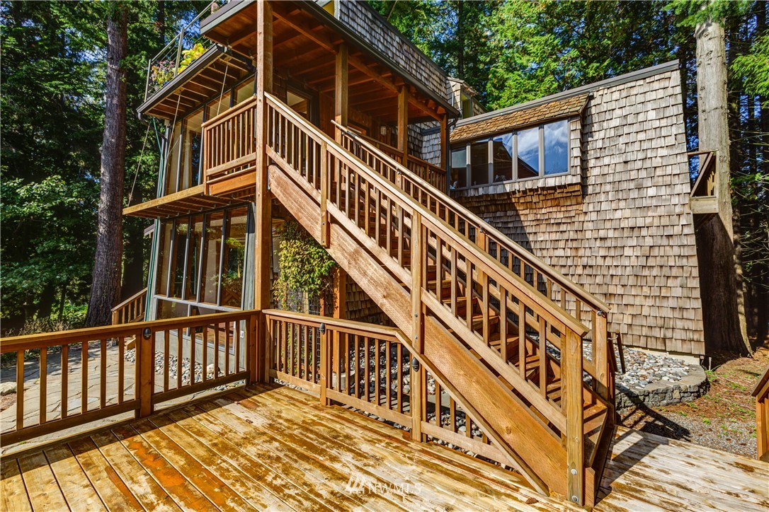 5852 Storr Road Ferndale, WA 98248 - Photo 3 of 25 a view of a house with wooden stairs