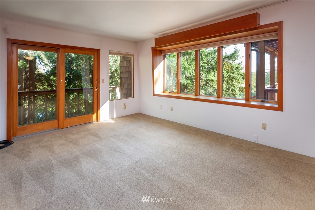 5852 Storr Road Ferndale, WA 98248 - Photo 7 of 25 en empty room with large windows