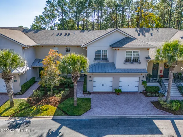 a bathroom with a sink vanity and toilet