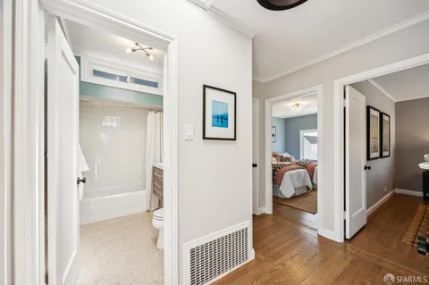 a view of a kitchen from the hallway