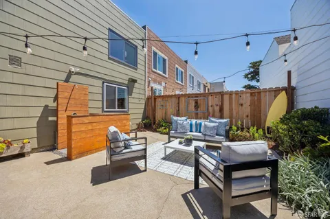 a house view with a outdoor space