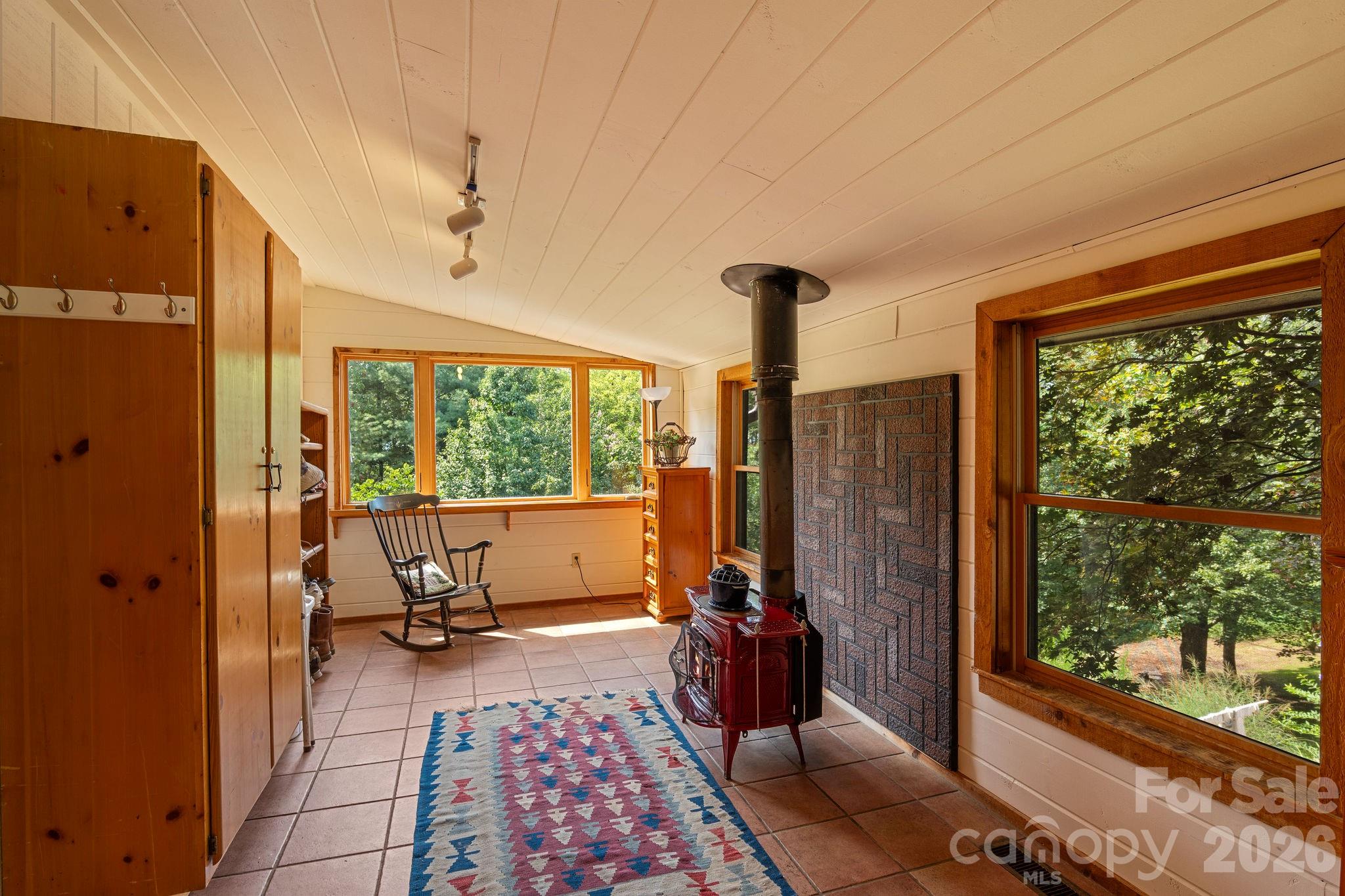 150 Avondale Ridge Road Asheville, NC 28803 - Photo 8 of 45 a living room with furniture and a window