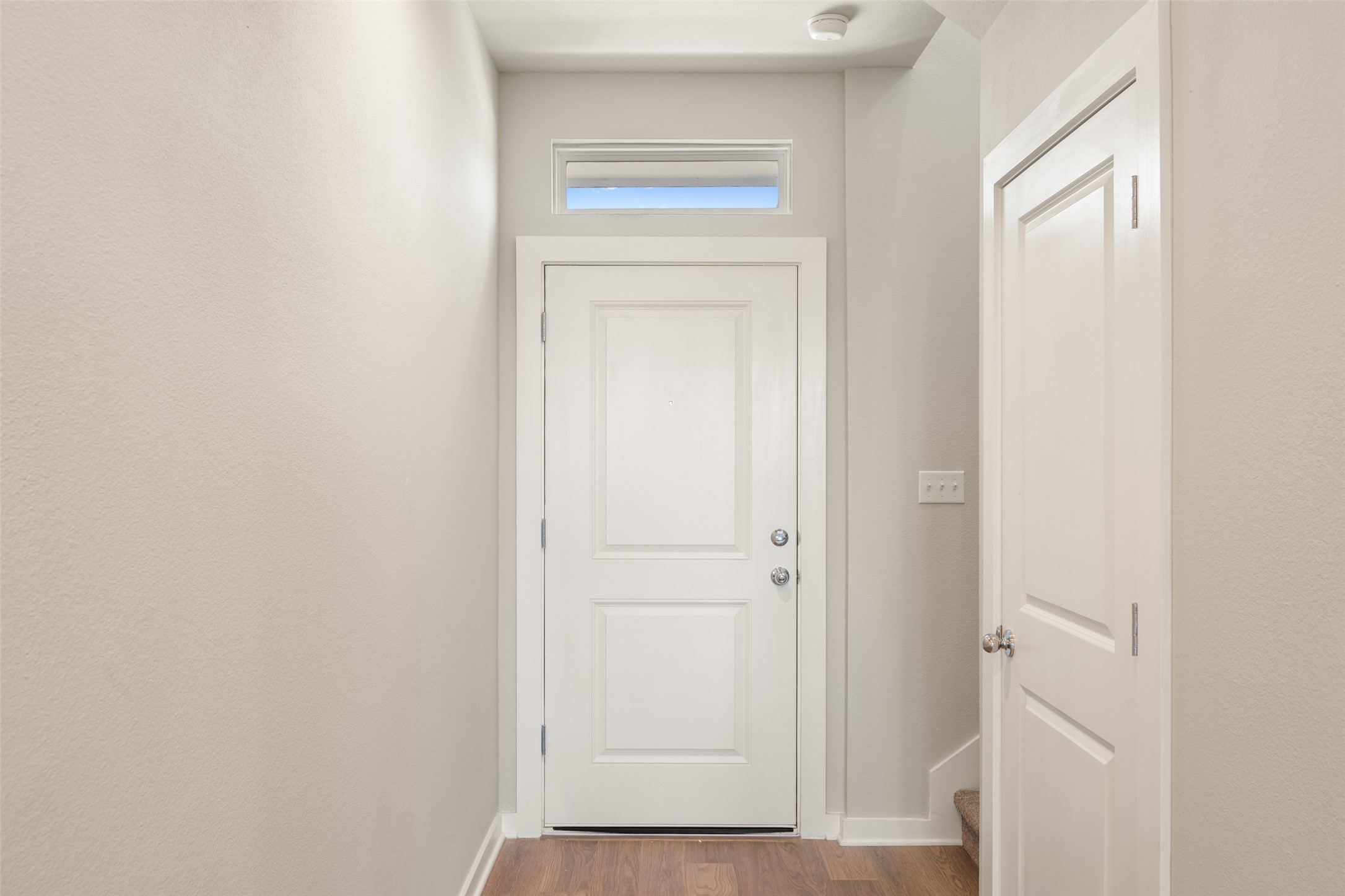 17408 Monastrell Lane Pflugerville, TX 78664 - Photo 2 of 31 Entryway featuring wood finished floors and baseboards