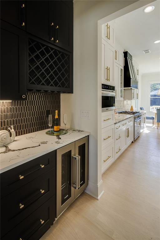 551 Sunset Drive Norcross, GA 30071 - Photo 15 of 45 a kitchen with a sink stove and cabinets