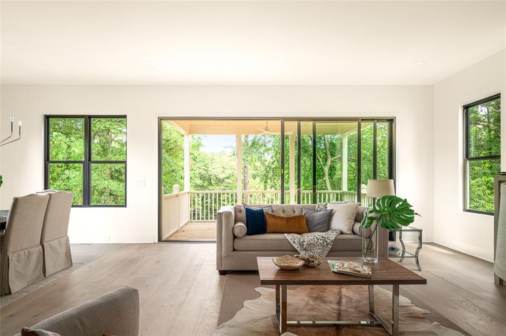 551 Sunset Drive Norcross, GA 30071 - Photo 19 of 45 a living room with furniture and a potted plant