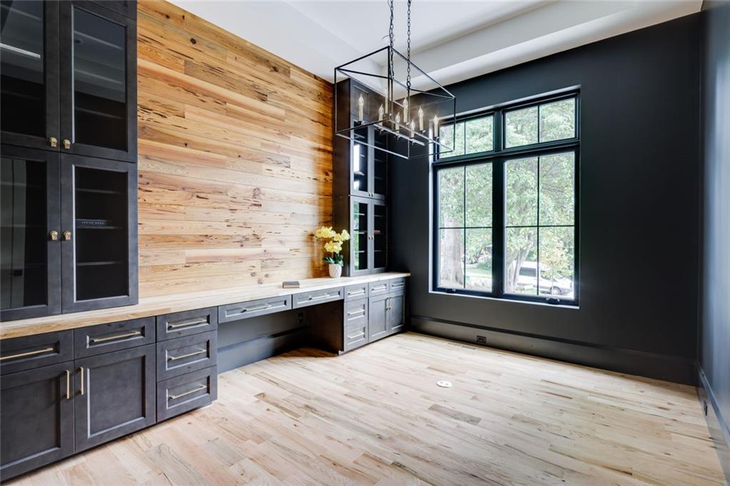 551 Sunset Drive Norcross, GA 30071 - Photo 28 of 45 a room with window and chandelier