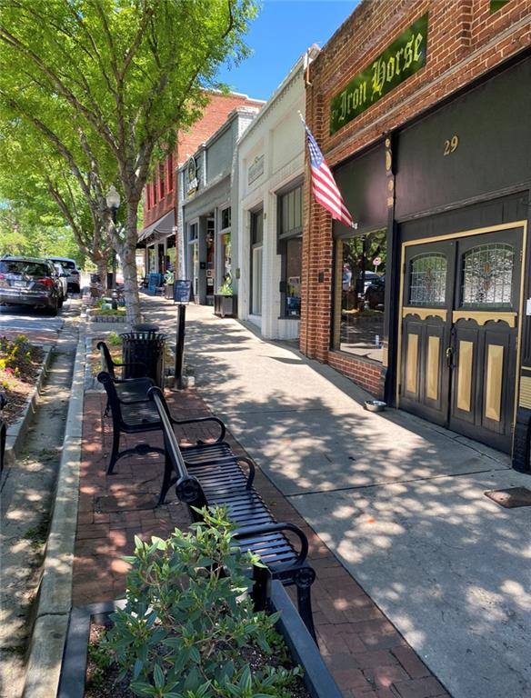 551 Sunset Drive Norcross, GA 30071 - Photo 40 of 45 a view of a building with sitting area