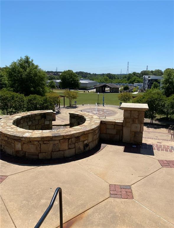 551 Sunset Drive Norcross, GA 30071 - Photo 42 of 45 a view of swimming pool and lake view