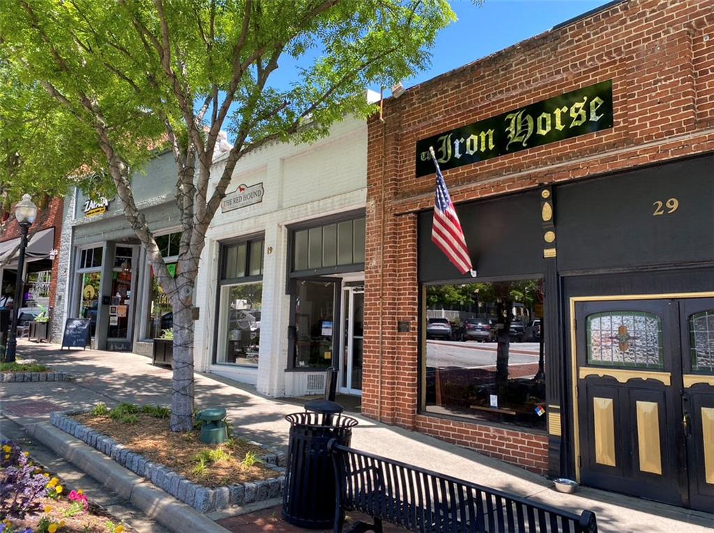 551 Sunset Drive Norcross, GA 30071 - Photo 45 of 45 a view of a building with a tree beside it