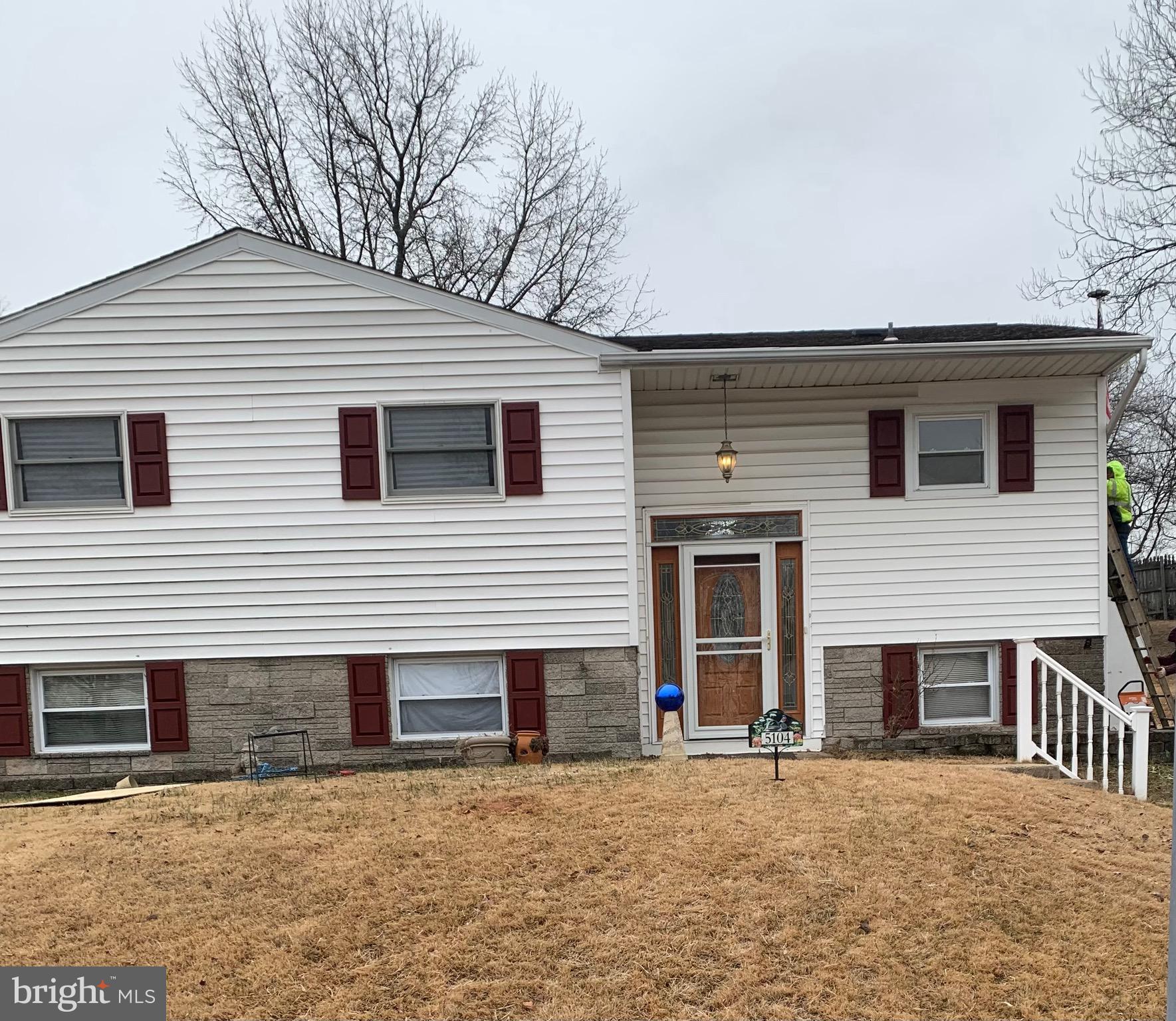 a front view of a house with garage