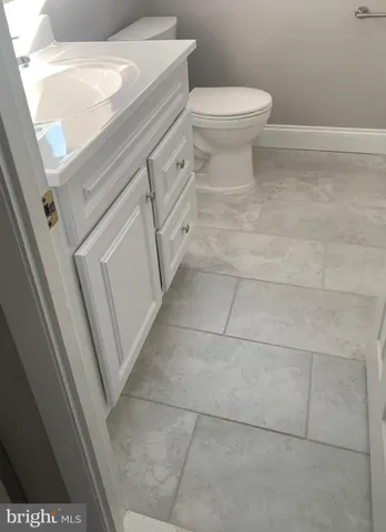 a bathroom with a sink and a toilet