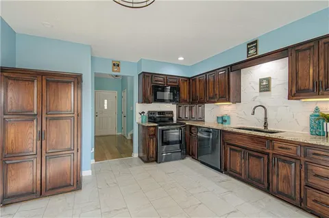 $369,000 | 3828 Northeast Beechwood Drive, Lee's Summit, MO 64064