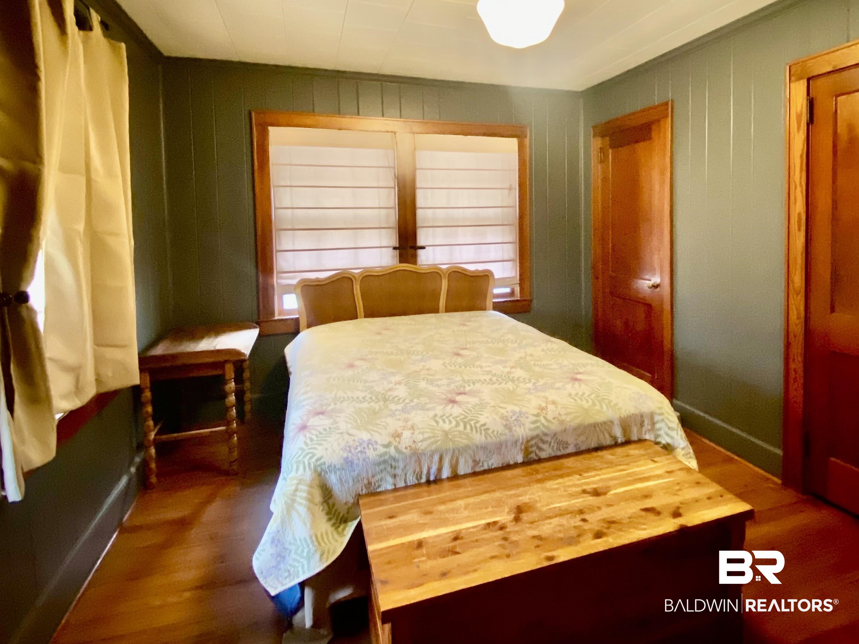 770 Arena Road Frisco City, AL 36445 - Photo 24 of 51 Bedroom with wood finished floors