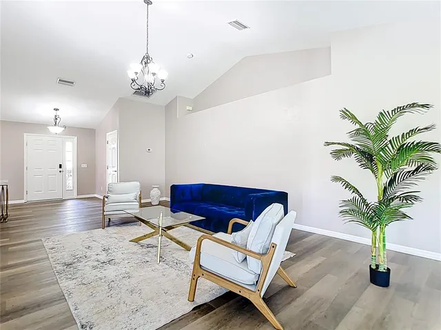 a stove top oven sitting inside of a kitchen