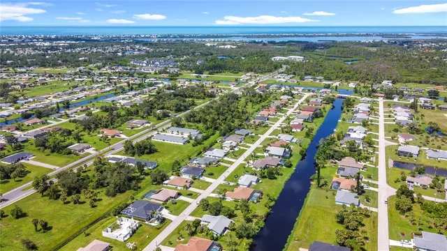 a view of city with ocean