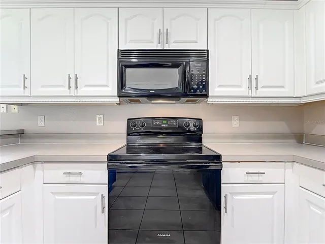 a bathroom with a toilet sink and shower